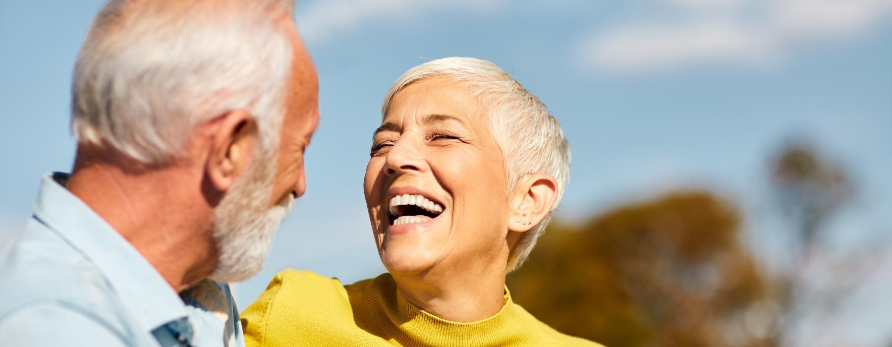 a man and a woman laughing